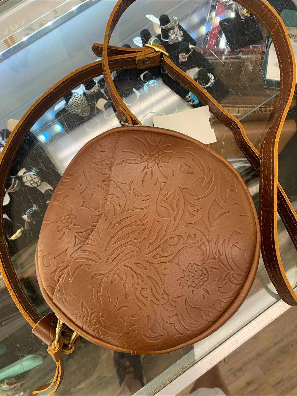 Portland Leather Brown Floral Embossed Round Crossbody Bag